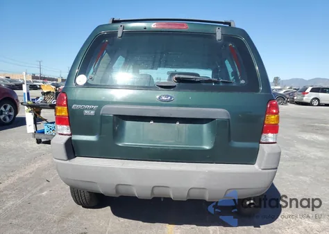 2002 Ford Escape Xls z USA, uszkodzony, nr VIN 1FMYU01182KD01293